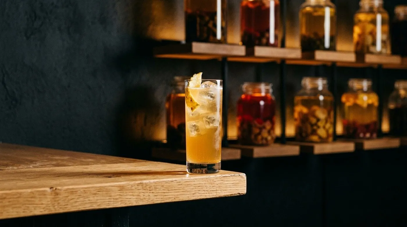 Tropical cocktail made with fermented pineapple tepache served with ice at STILLROOM, signature cocktail bar in Madrid