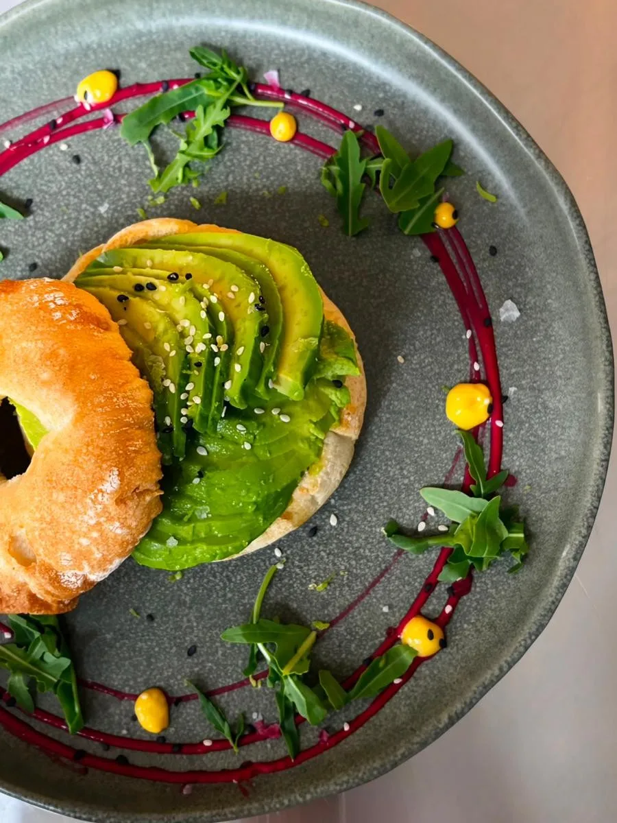 Avocado bagel with lime, flaked salt and seeds from Stillroom's brunch menu